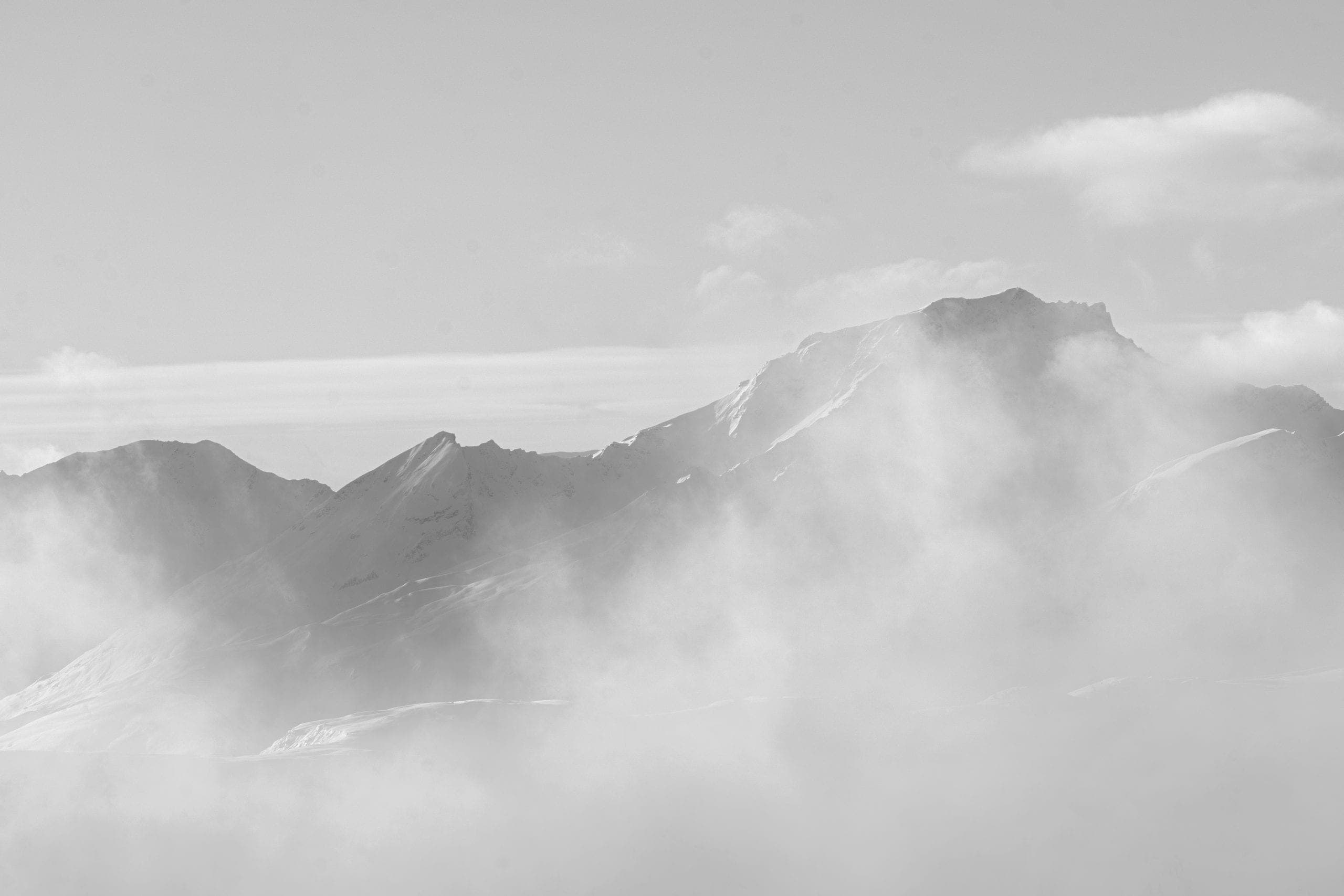 Courchevel peaks in the mist, black and white