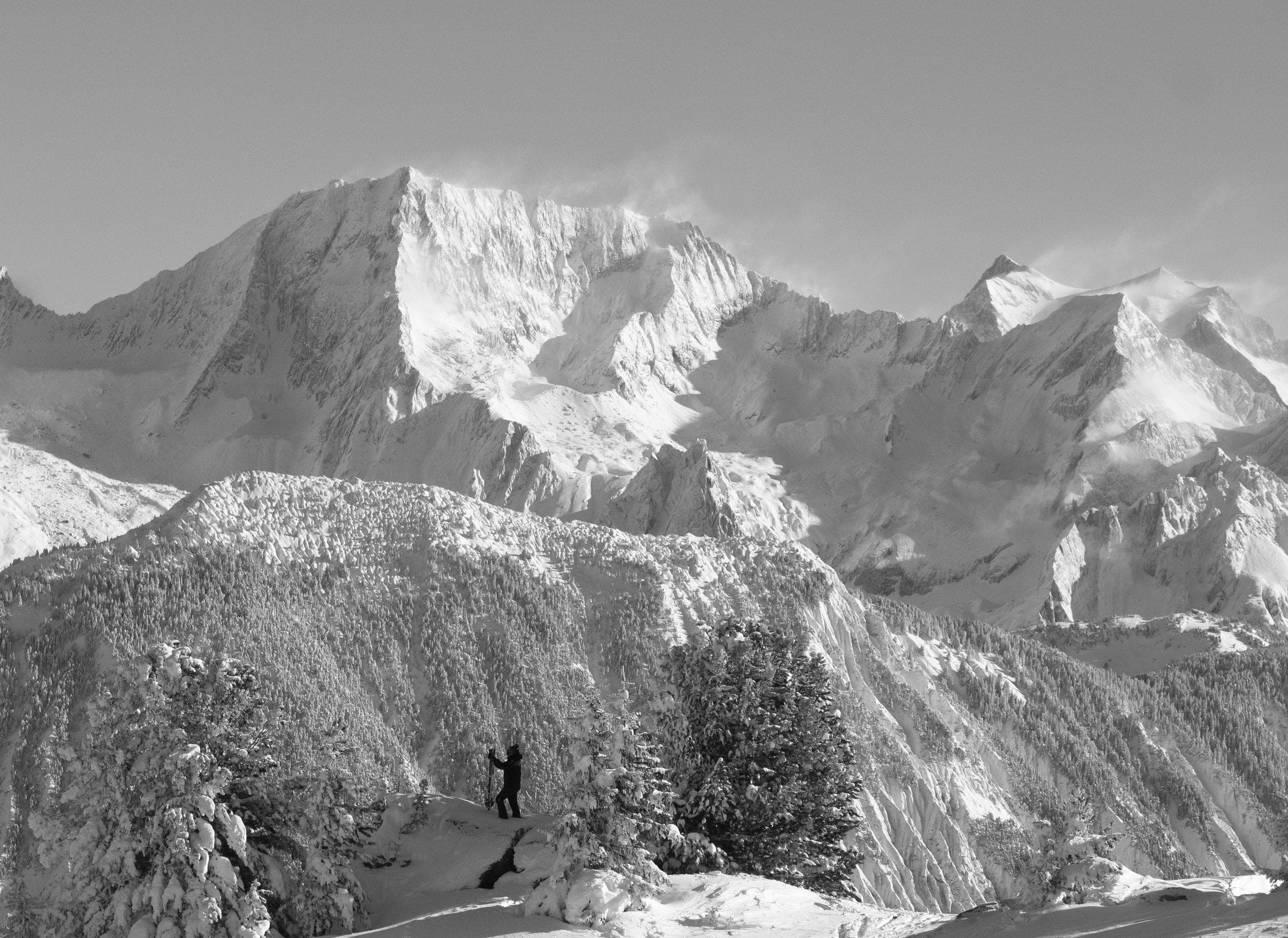 Panorama of Courchevel's snow-capped peaks, black and white