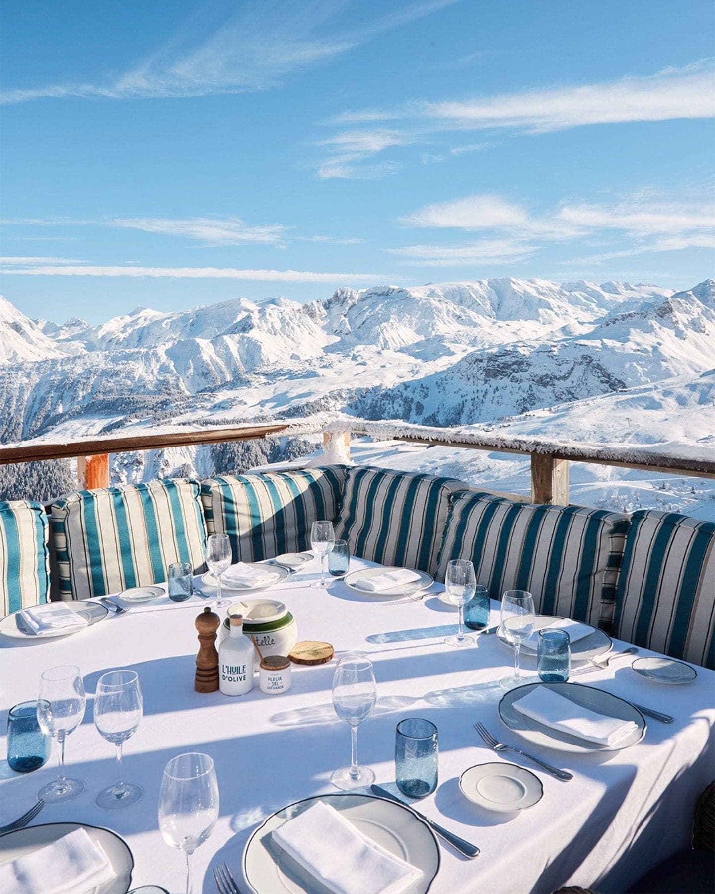 Mountain restaurant terrace facing the snow-capped peaks